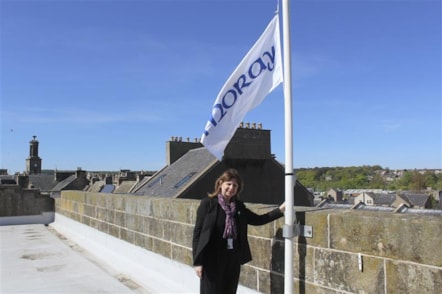 A photo of Moray Council Chief Executive Karen Greaves, beside a lowered Moray Council flag, for International Workers Memorial Day