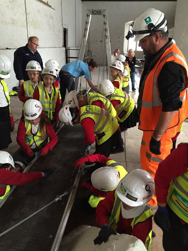 Network Rail staff helping children at the Build a Bridge event