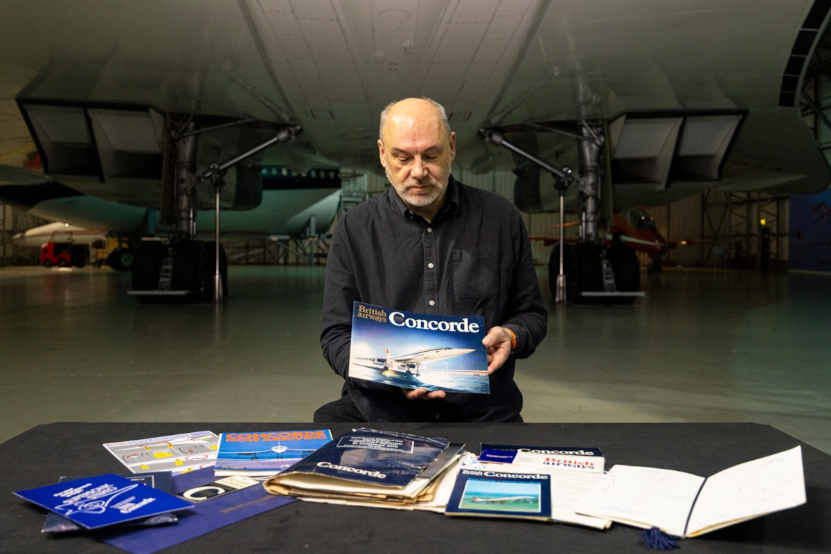 Curator Ian Brown under the wings of Concorde G-BOAA with the archive. Photo © Duncan McGlynn (2)