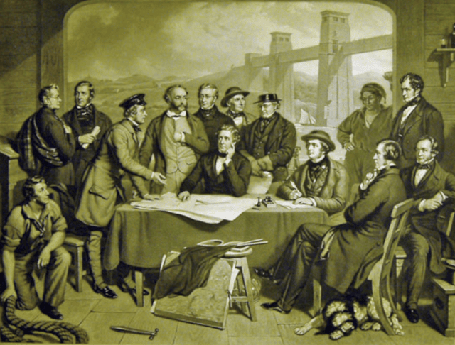 Britannia Bridge - Robert Stephenson and celebrated engineers raising the tubular bridge conference, by John Lucas, circa 1858 - credit NRM York.: Britannia Bridge - Robert Stephenson and celebrated engineers raising the tubular bridge conference, by John Lucas, circa 1858 - credit NRM York.