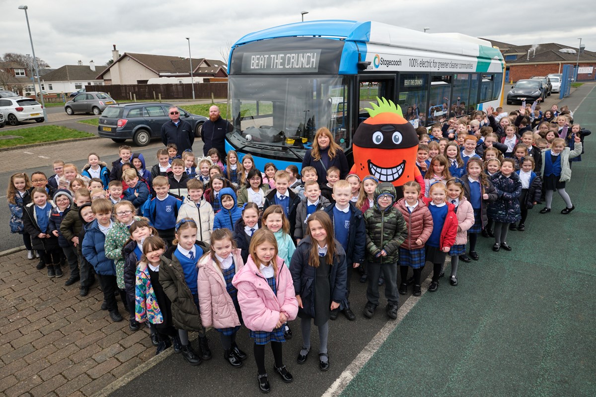 Super Tattie, Cllr Cowan, HT Julie McKee, Graham McCann Stagecoach Operations Manager, bus driver Mark Podger and the children and young people from Gargieston PS