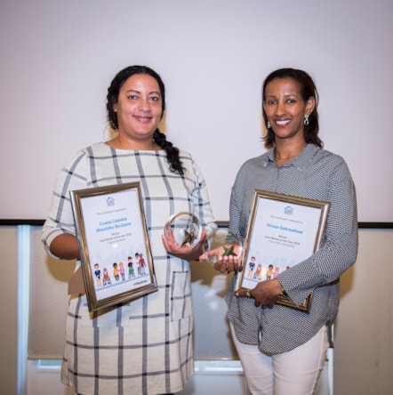 Both overall winners pictured with their trophies and certificates