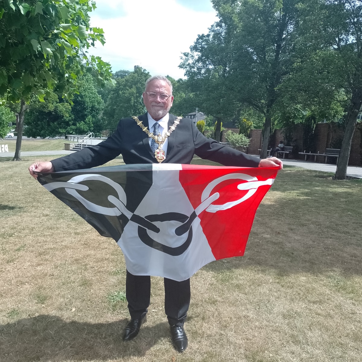 Cllr Pete Lee, the Mayor of Dudley, with the Black Country flag