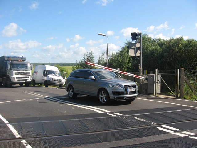 CURTAIL CRAZY DRIVING AT LEVEL CROSSINGS OR RISK MORE LIVES, SAYS RAIL CHIEF (SUSSEX): Motorist gets trapped under barrier at Yapton level crossing, West Sussex