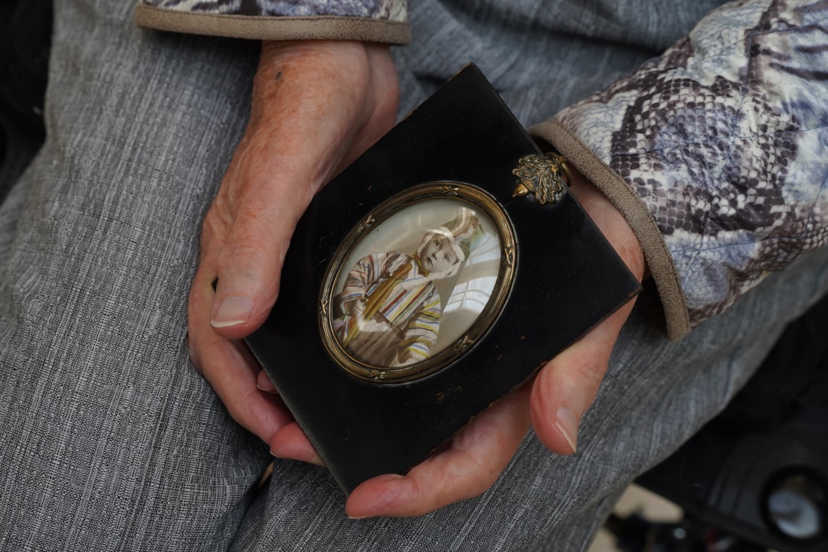 Mary Davidson Smith, 104, holds a childhood photograph. Photo © Stewart Attwood (2)