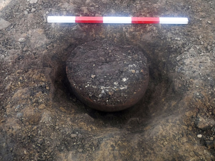 Pitty Close Farm finds: Archaeologists excavated the site at Pitty Close Farm in Leeds.
As well as the cremated remains of a child and three adults, the dig uncovered fragments of a decorated clay urn (pictured), part of a pin which was carefully carved from a piece of animal bone and the shattered blade of a delicately honed flint knife.
Photo credit WYAAS.