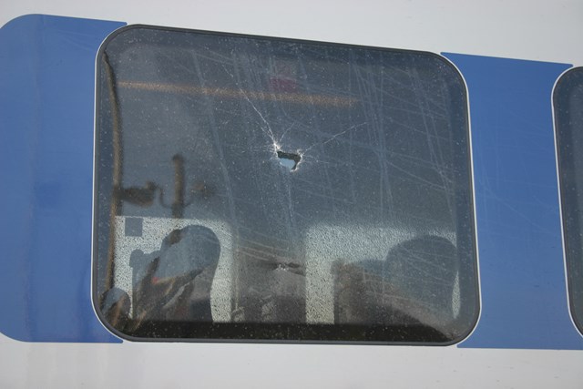 Damage caused by stone throwing: .