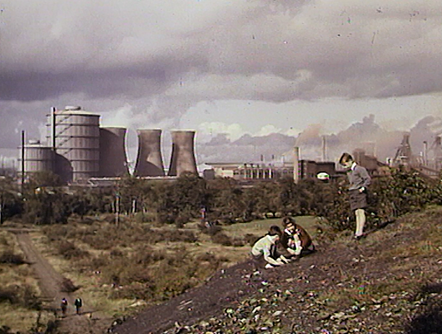 2204 Children playing atop coal bing 1960s