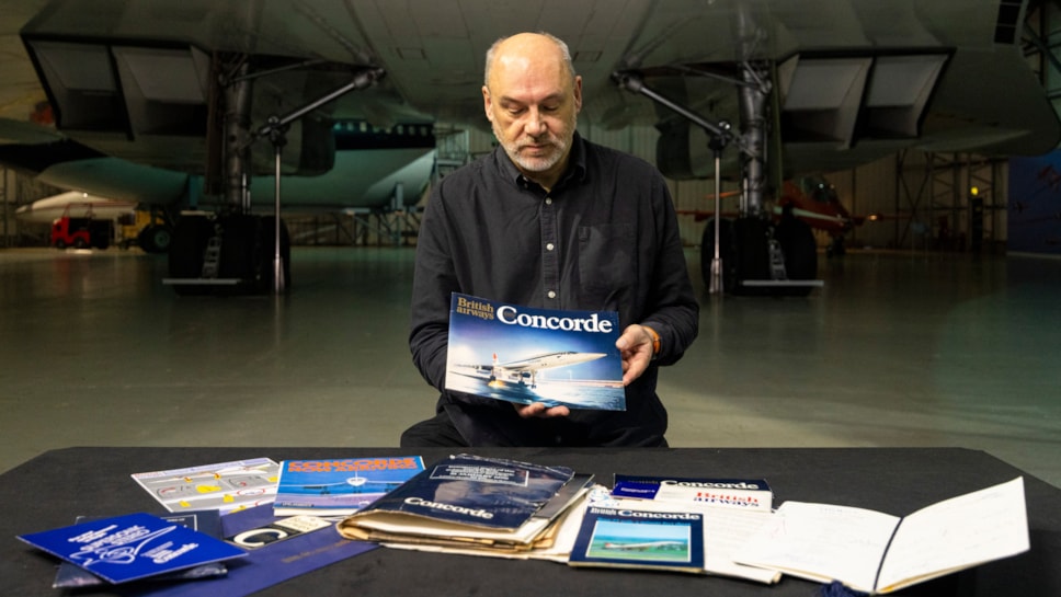 Curator Ian Brown under the wings of Concorde G-BOAA with the archive. Photo © Duncan McGlynn (2)