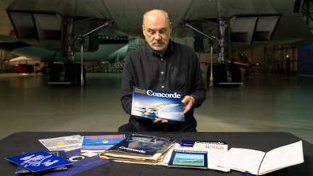 Curator Ian Brown under the wings of Concorde G-BOAA with the archive. Photo © Duncan McGlynn (2)