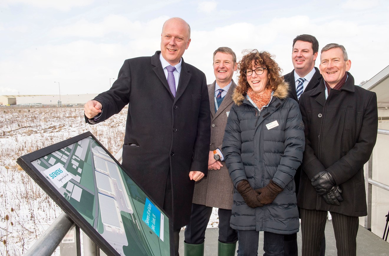 Siemens plans new rail factory in Goole 4: Transport Secretary Chris Grayling views the Goole site with, from left, Gordon Wakeford, Siemens’ Managing Director, UK Mobility Division, Ruth Humphrey, Siemens’ Project Director, Andrew Percy MP, and Vernon Barker, Managing Director, Siemens’ UK Rolling Stock Business Unit.