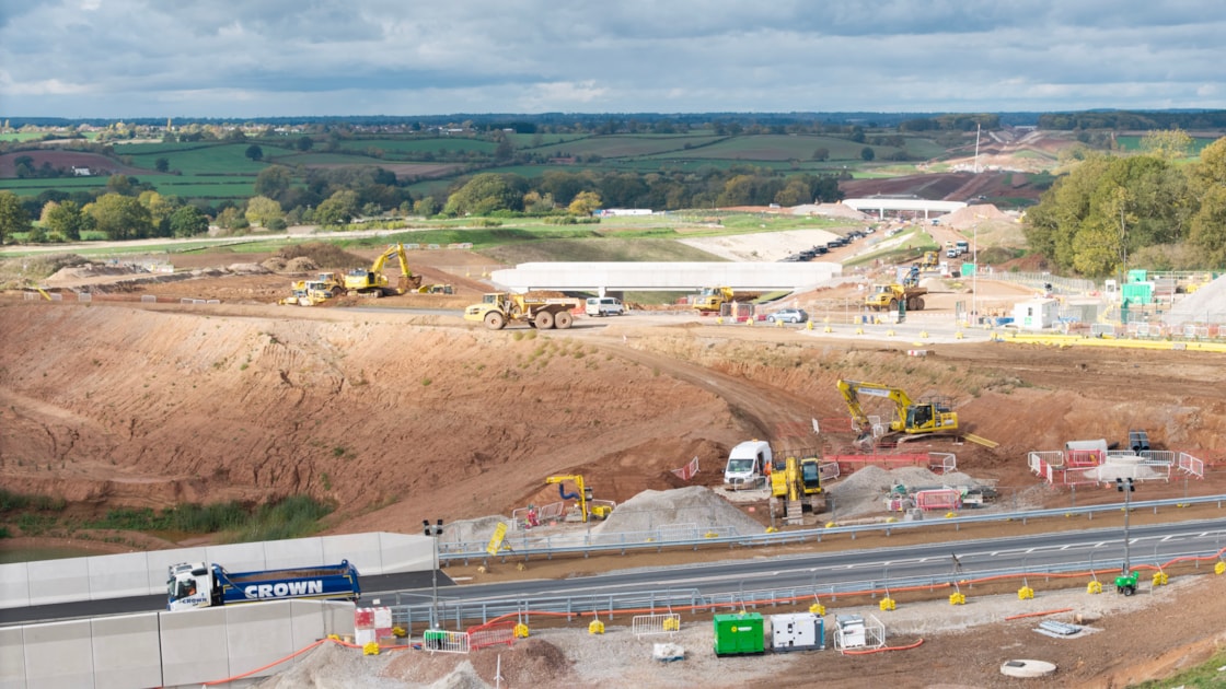 Traffic crossing the Fosse Way (B4455) bridge with Offchurch Greenway bridge and then Hunningham Road bridge behind Oct 2025