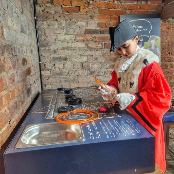 Children's Mayor - Mechanic: The children's mayor is having a go at being Temple Newsam's mechanic.