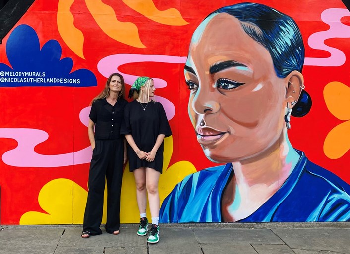 Merrion Gardens 1: Mural artist Melody Sutherland (right) with mum Nicola in front of the new artwork in Merrion Gardens.