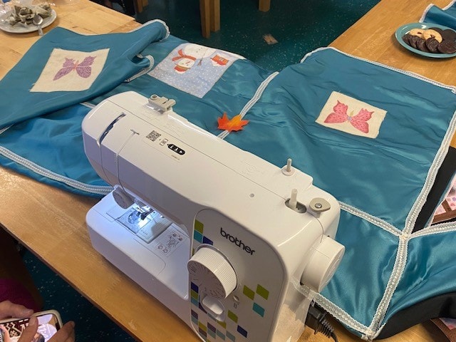 A blue incubator cover, one of 12 being made by the Afghan refugee group in Lancashire,  for premature babies at Furness General Hospital in Cumbria.