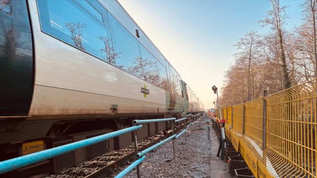 Landslip repairs completed ahead of schedule on railway between Three Bridges and Gatwick Airport: Southern train passes as first phase of landslip repairs completed