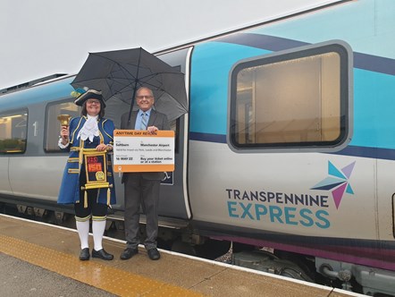 Sharon Wilson, Saltburn Town Crier & Councillor Cliff Foggo, Cabinet Member for Highways and Transport for Redcar & Cleveland Borough Council celebrate new TPE rail link