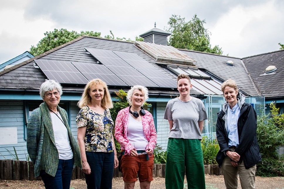 Cllr Champion (far right) and Nature Conservation Manager Jo Corrall (second from the right) pose with volunteers outside the Ecology Centre