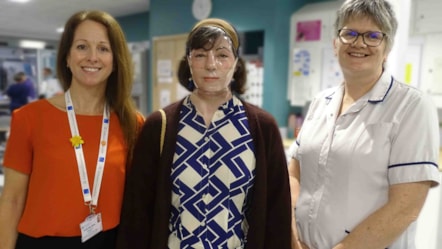 Sian Morgan with consultant intensivist Nia Wyn Davies and burns clinical specialist physiotherapist Menna Davies