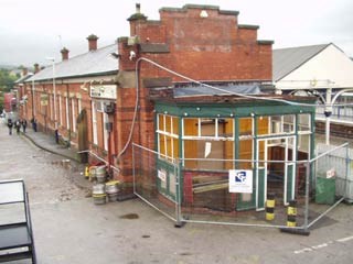 Stalybridge buffet bar - demolition begins: Demolition of old conservatory begins