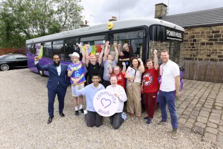 Mubs Mahmed (left) and driver trainer Debbie celebrate with teachers and students