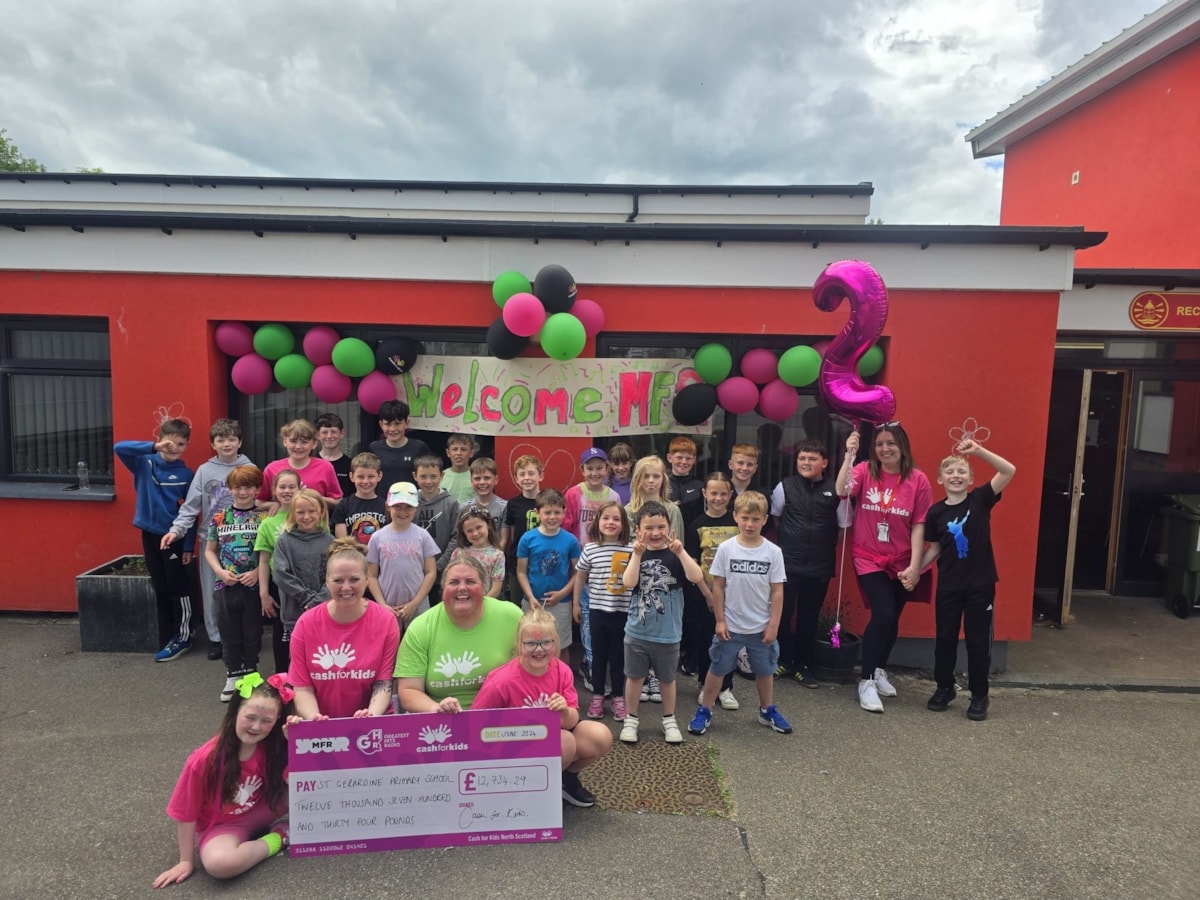 St. Gerardine primary school staff and pupils celebrate after securing 2nd place in the MFR schools challenge.