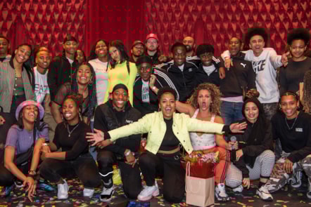 Angelia front with other contestants backstage
