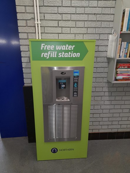 A water dispenser at Levenshulme station
