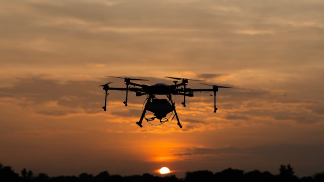 Drone flying at sunset cropped