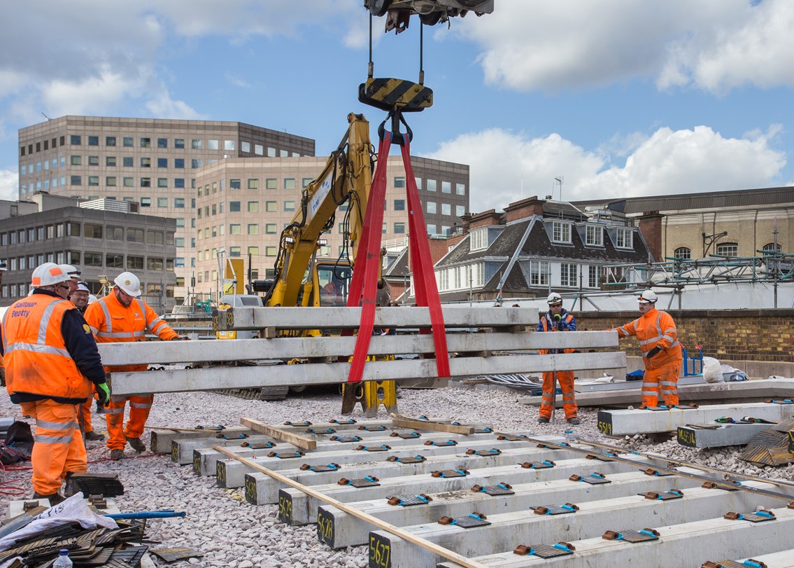 Sleepers lifted into place at LBG: Sleepers are lifted into place just outside platforms 1 and 2 at London Bridge station. These will form part of the new lines 1 and 2 due to be commissioned over the Easter weekend.