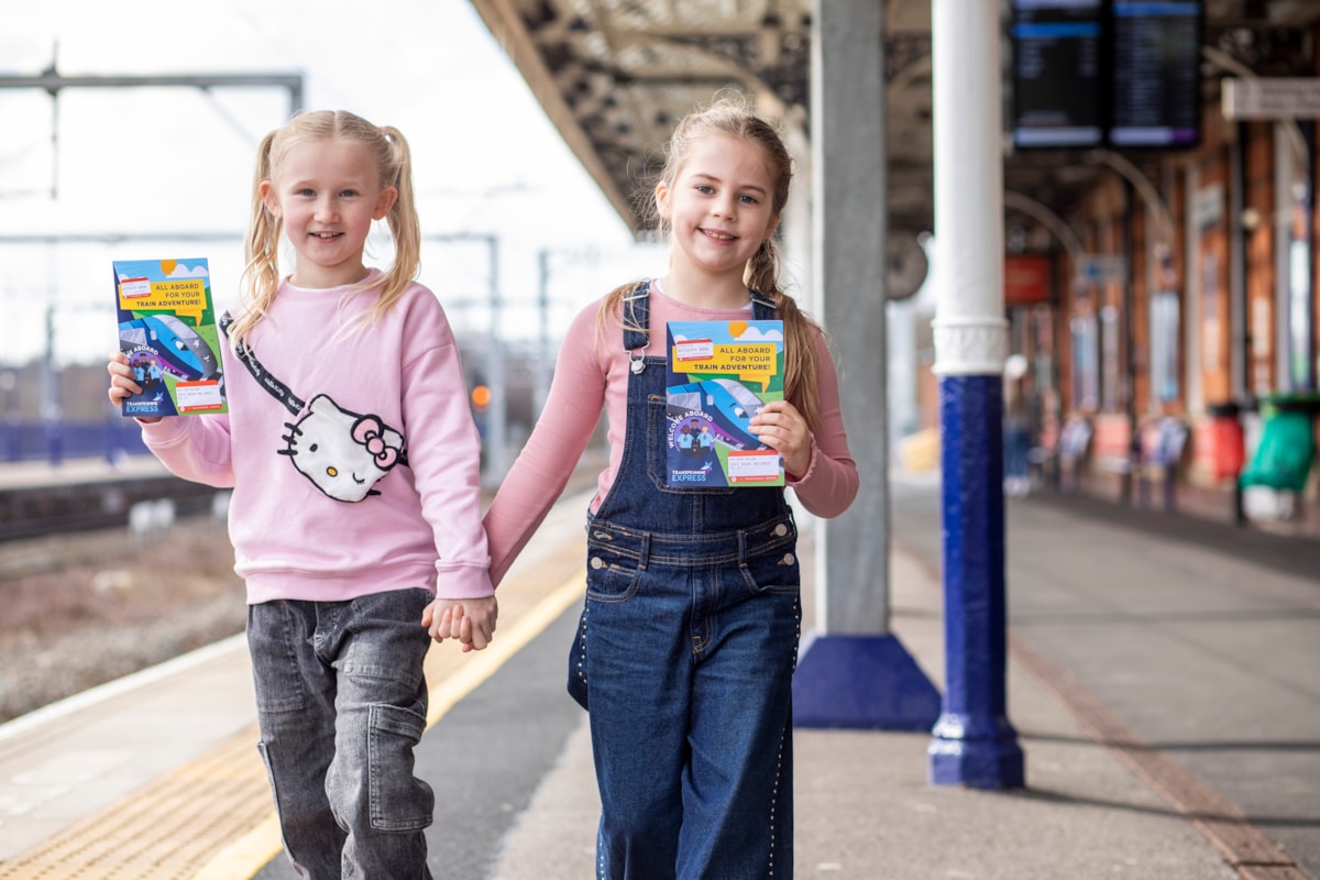 Lucy and Ivy, 7, prepare to set off on their journey with the new TPE activity book