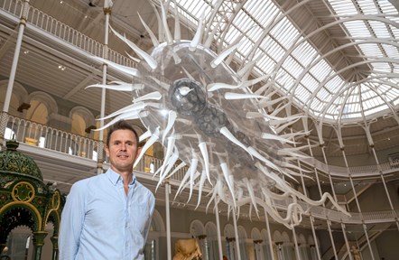 Artist Luke Jerram and his sculpture E.coli at the National Museum of Scotland. Photo © Neil Hanna