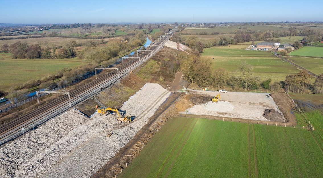 Wide drone shot showing Hopsford Hall embankment work Spring 2021