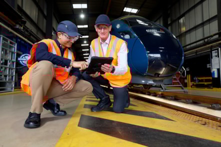 Samraj Ojelay and Andrew Skinner in front of an Avanti West Coast Evero