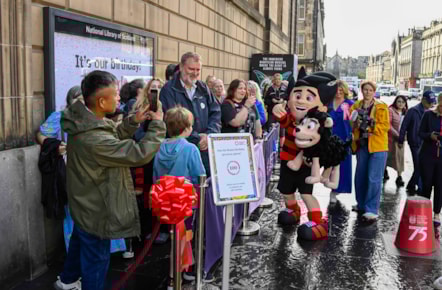 Beano fans queue outside the National Library of Scotland's George IV Bridge building. The Library was giving away special centenary editions of the comic to mark the Library's 100 birthday, which fell on 7 August. Credit: Neil Hanna