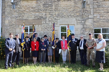 Cllrs, serving troops and veterans stood outside the Council offices.