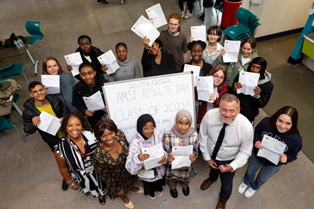 Students at Arts & Media School Islington celebrate their GCSE results with headteacher Susan Service (front row, far left), Cllr Ngongo (front row, second from left), and Jon Abbey (front row, second from right)