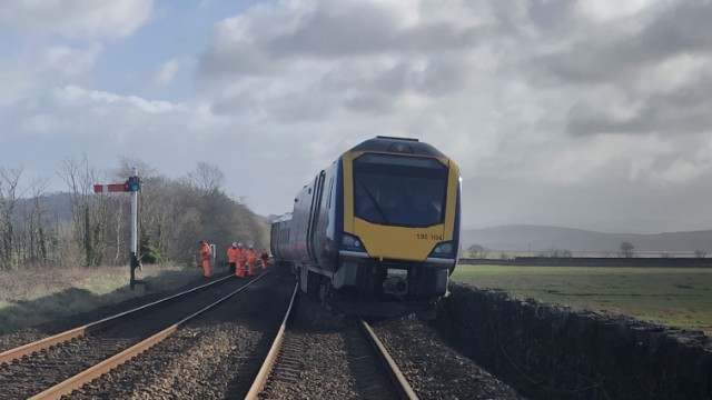 Network Rail engineers attending the site of the derailment: Network Rail engineers attending the site of the derailment