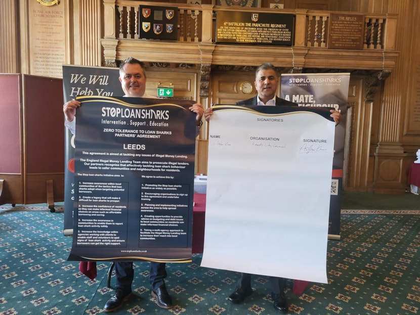 Leeds comes together to stop loan sharks: Dave Benbow and Cllr Asghar Khan with charter