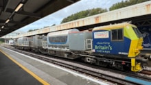 A leaf busting train at Hastings station: A leaf busting train at Hastings station