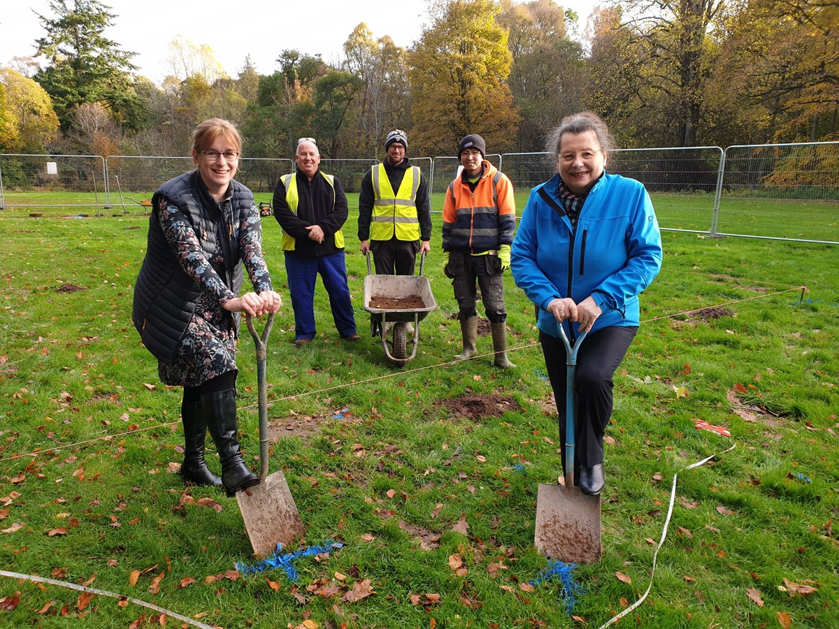 Moray Council leader Kathleen Robertson (left) with Ann Rossiter, and contractors, standing where the new outdoor gym will be built.