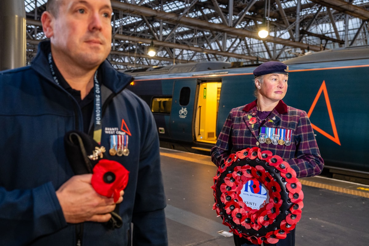 Avanti train driver Greig Gibson with Vicky Lawson from the Royal British Legion at Glasgow Central Station.