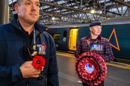 Avanti train driver Greig Gibson with Vicky Lawson from the Royal British Legion at Glasgow Central Station.