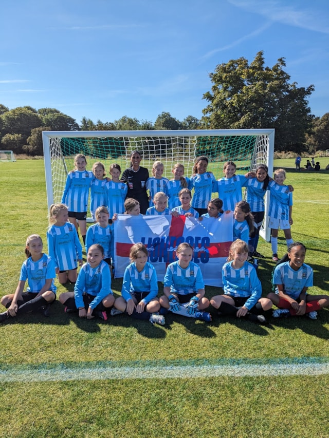 Surekha Griffiths, FA Grassroots Official of the Year 2023, with a team from the Regent’s Park Girls League