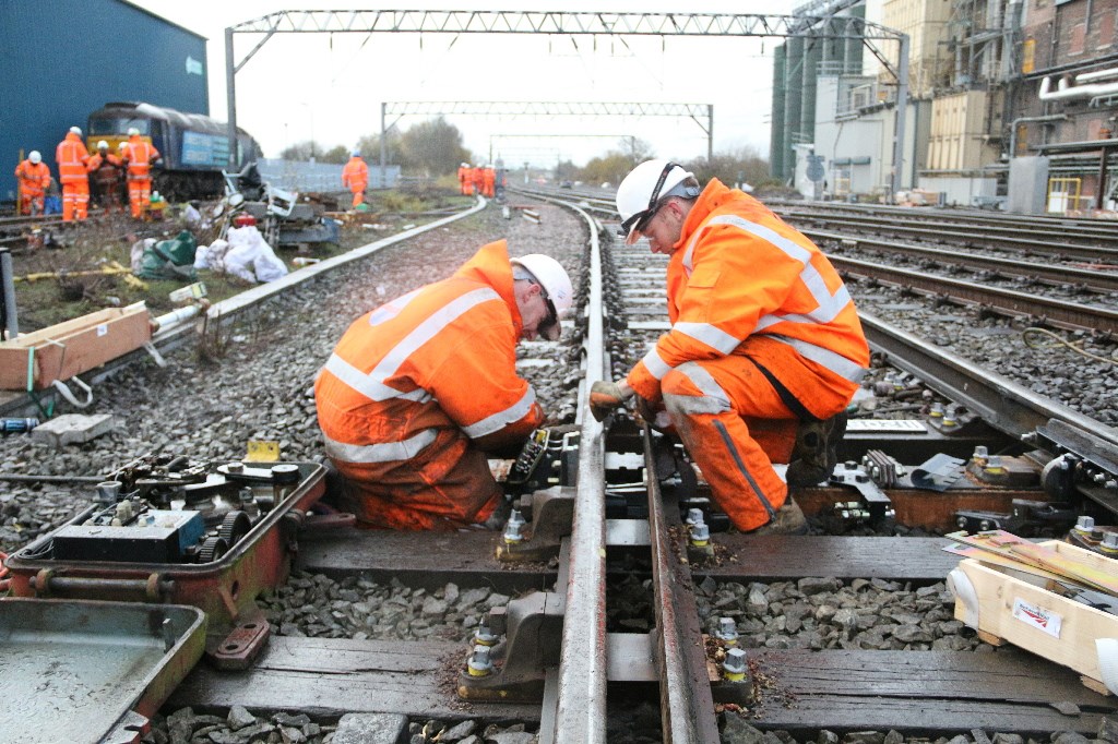 Trains running on upgraded railway between Crewe and Shrewsbury: Point Gauging Team working on resignalling between Crewe and Shrewsbury