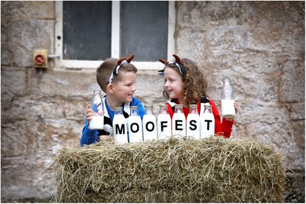 Emily Birrell and Harry Anderson from Mossneuk Primary get ready for MooFest at National Museum of Rural Life in East Kilbride this Saturday 16 and Sunday 17 September. Supported by Players of People’s Postcode Lottery, the fun family event is a unique celebration of cattle featuring butterchurning workshops, demonstrations, trails, storytelling, crafts and food. Image credit: Paul Dodds.