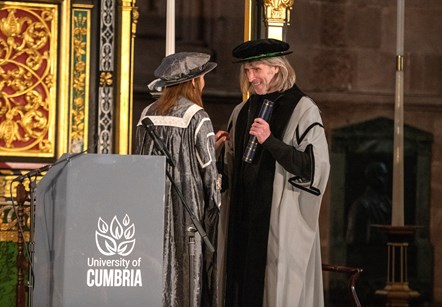 Music producer and songwriter Brian Higgins, born and raised in west Cumbria, at Carlisle Cathedral after the University of Cumbria bestows an Honorary Fellowship upon him in recognition of his lifelong and outstanding contribution to the music industry. 
University Vice Chancellor Professor Julie Mennell presents Brian with his honorary award.
24 November 2022.
Credit: University of Cumbria/Jonathan Becker