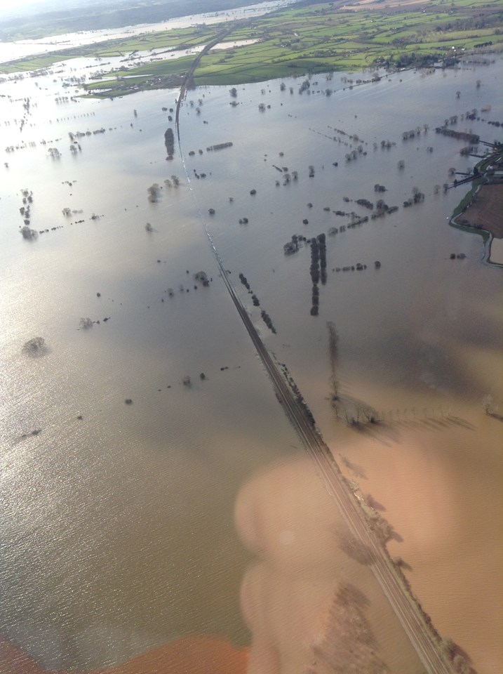 Flooding at Bridgwater, with the railway running across the centre of the picture: Flooding at Bridgwater, with the railway running across the centre of the picture
