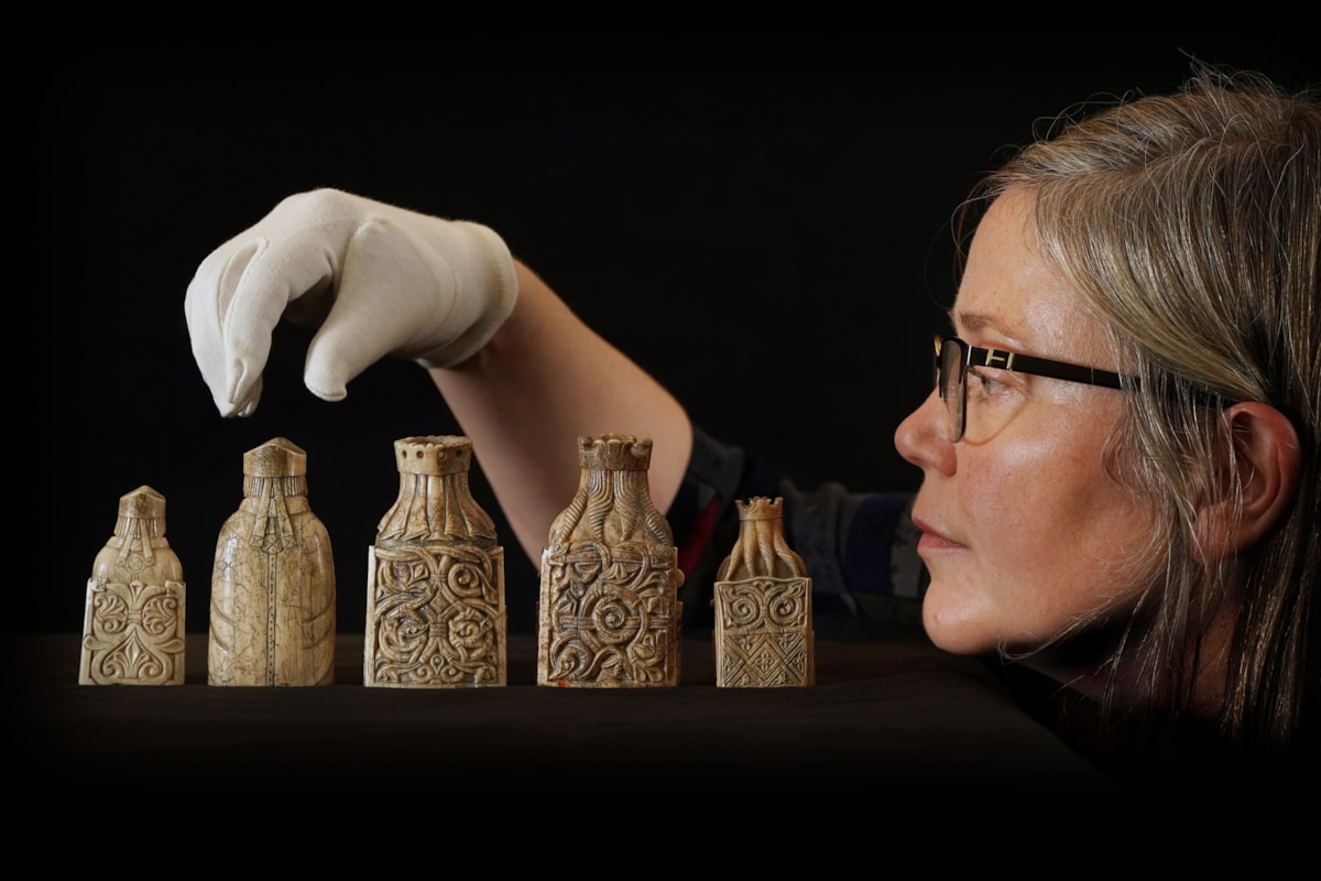 Dr Alice Blackwell with some of the Lewis chess pieces. Copyright Stewart Attwood (1)