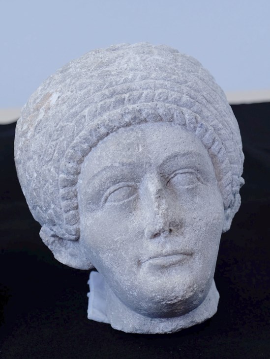 Front of cleaned female roman bust head: Since the discovery of a set of three Roman busts at the site of the old St Mary’s Church in Stoke Mandeville, Buckinghamshire, initial conservation has been completed by L-P Archaeology, working for HS2’s Enabling Works Contractor Fusion JV. The cleaning process has revealed delicate details on the sculptures, such as tear ducts and the curvature of the lips on the female carved head. 
Tags: Archaeology, Buckinghamshire. Roman, Conservation